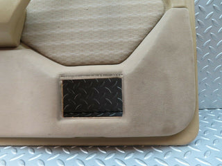 W124 rear left door card beige used OEM