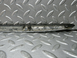 R107 SLC trunk chrome handle used OEM