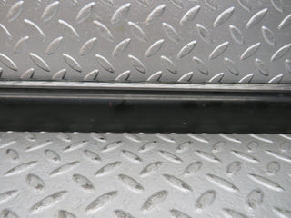 W123 front left door lower moulding trim used OEM
