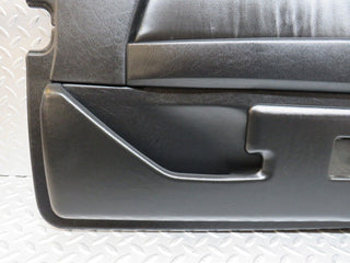 W124 Cabriolet left door card black used OEM