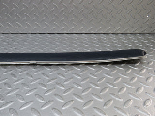W109 rear left door card top trim blue used OEM