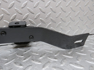 W109 rear bumper bracket left side used OEM