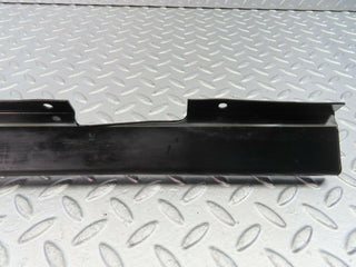 W123 cable channel cover front left used OEM