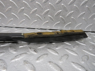 R129 SL left door front window channel used OEM