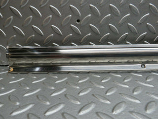 R107 SLC right door sill chrome used OEM