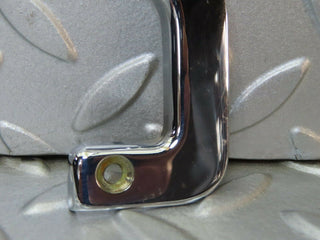 W115 left interior chrome door latch trim used OEM