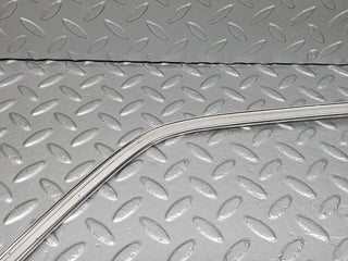 W123 front right door window chrome frame used OEM