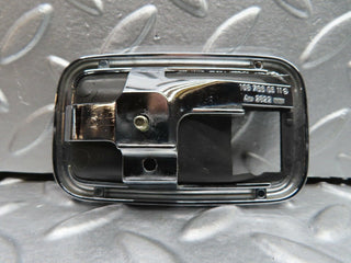 W123 chrome frame for door opener left used OEM