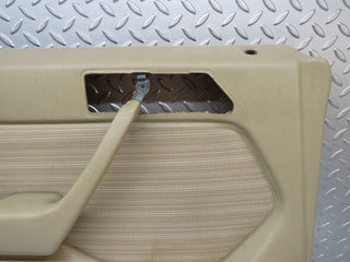 W124 rear left door card beige used OEM
