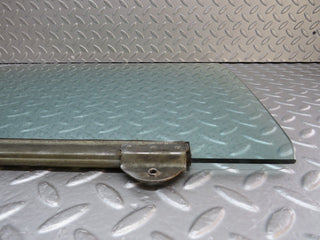W109 front left door window glass used OEM