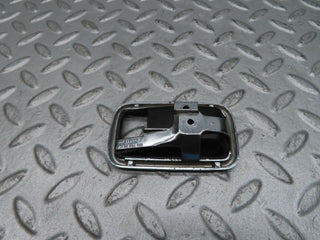 W108 chrome frame for door handle left used OEM