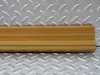 W123 front right door sill trim palomino used OEM