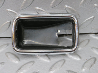 W123 chrome frame for door opener right used OEM