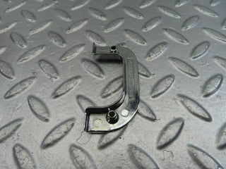 W123 left interior chrome door latch trim used OEM