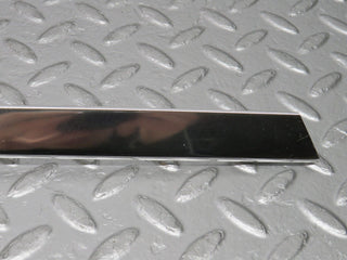 R107 SLC rear left window chrome used OEM