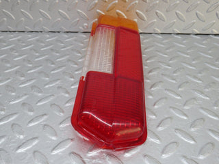 W109 tail light lens left side used OEM
