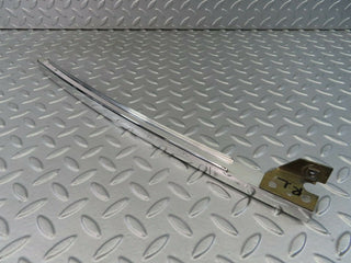 W116 rear left chrome window channel used OEM