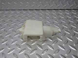 W124 Wagon rear door lock vacuum actuator cover used OEM