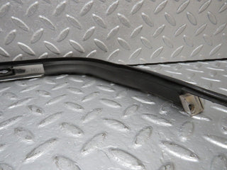 R129 SL left headlight lower trim used OEM