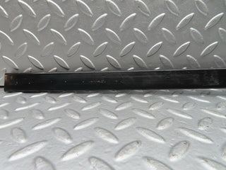 W123 left seat belt runner with cover used OEM