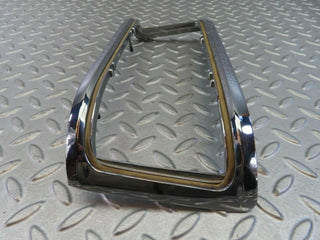 W115 tail light chrome frame left used OEM