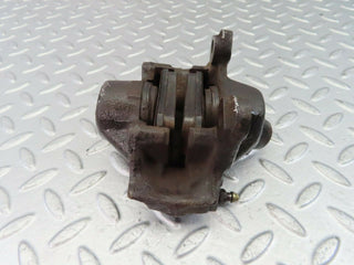 W124 Coupe rear left brake caliper used OEM