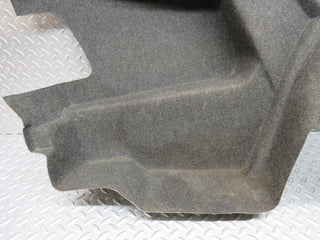 W124 trunk panel cover left used OEM