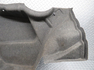 W124 trunk panel cover left used OEM
