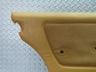 W123 rear left door card panel beige used OEM