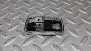 W109 chrome frame for door opener left used OEM