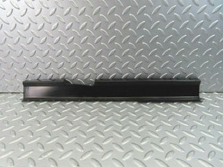 W123 Coupe cable channel cover front left used OEM
