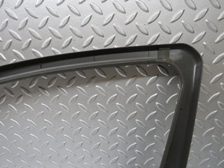 W221 front left door window frame trim used OEM