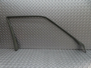 W124 front left door window frame trim cover used OEM