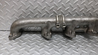 W126 Coupe exhaust manifold left side used OEM