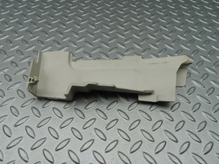 W124 lock cover front left used OEM