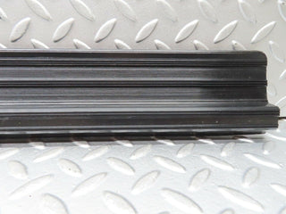 W123 rear right door sill trim black used OEM