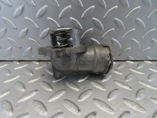 W221 thermostat housing used OEM