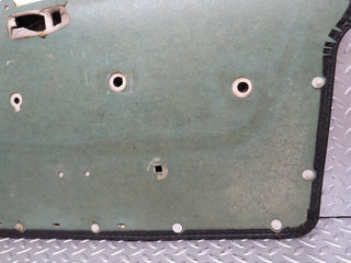 W123 front left door card black used OEM