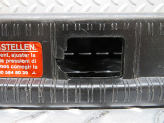 W124 trunk lock trim panel used OEM