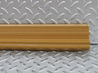 W123 rear right door sill trim palomino used OEM