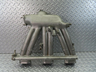 W111 intake manifold used OEM