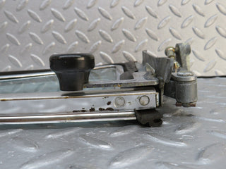 W109 front left quarter window glass used OEM