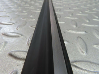 W123 front left door lower trim new OEM
