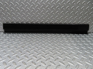 W123 front left door sill trim black used OEM
