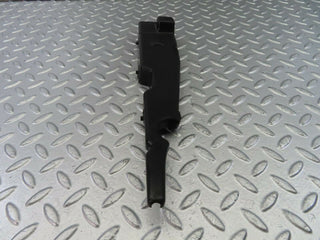 W123 bonnet catch cover used OEM