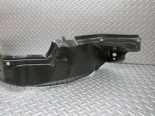 W124 front left inner fender wing splash guard used OEM