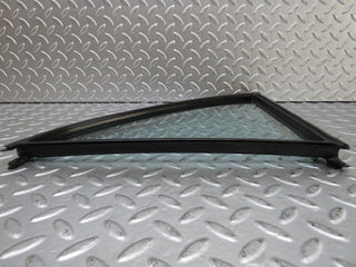 W123 rear left quarter window glass used OEM