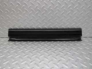 W123 rear right door sill trim black used OEM