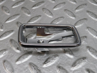 W123 chrome frame for door opener right used OEM