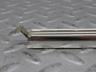 W108 rear left door window chrome channel used OEM